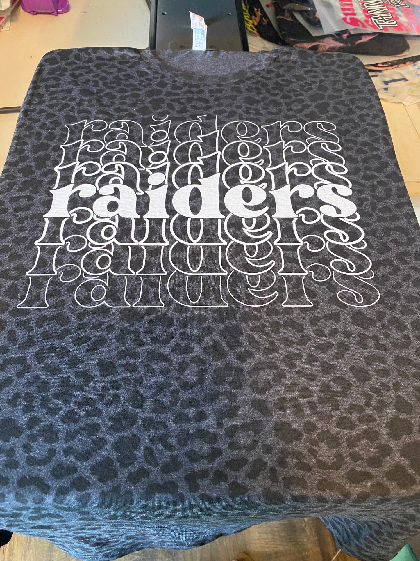Raiders white split logo
